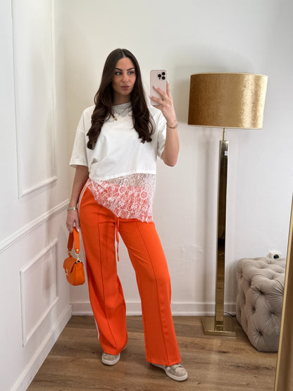 Broek met bies zijkant lang - oranje