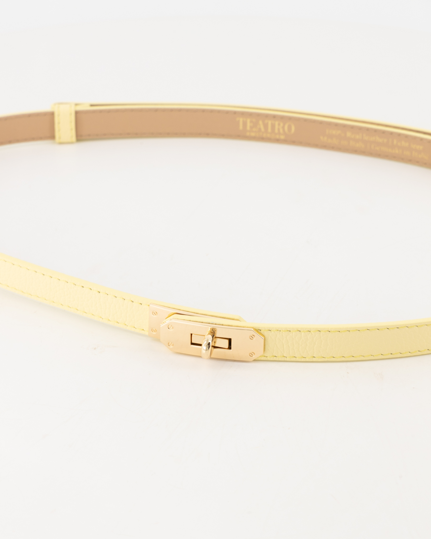 Verstelbare riem - botergeel