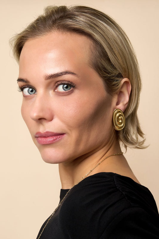 Twist oorbellen - goud